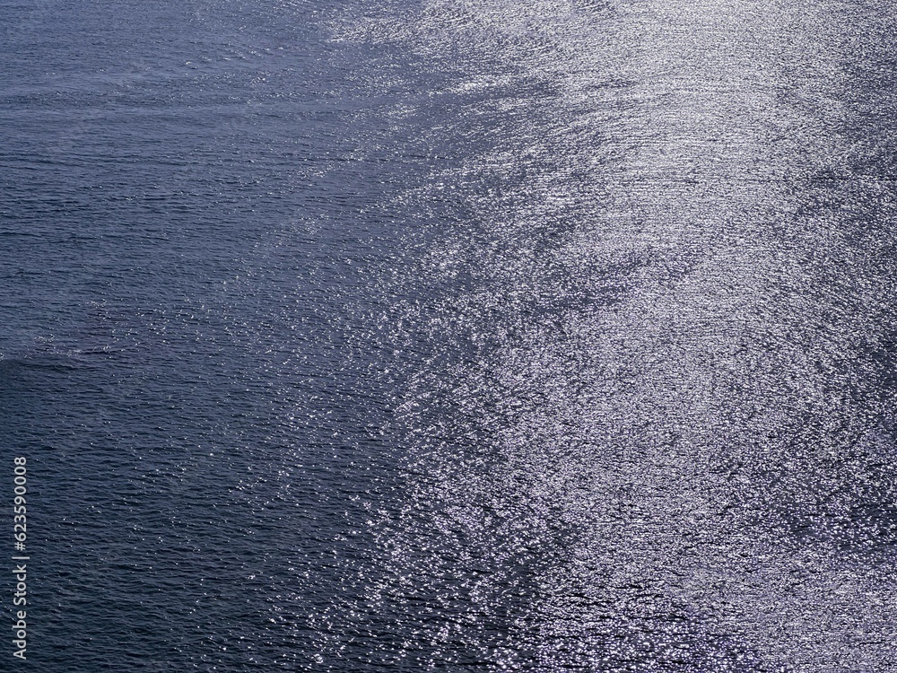 Sea water seascape glittering surface blue silver at night. Sea water seascape glittering surface blue silver at night.