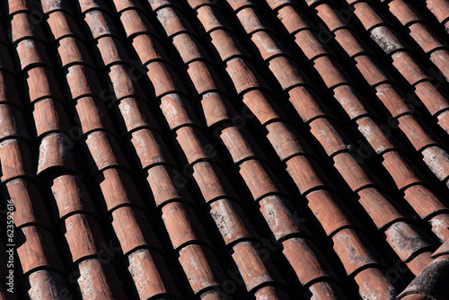 red or brown tile pattern for house roof, old house roof