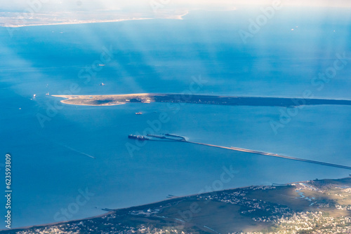 Aerial view of the pier at Naval Weapons Station Early and Fort Hancock at Sandy Hook Park in the Raritan Bay on the coast of New Jersey in Leonardo, Atlantic Highlands, and Highlands