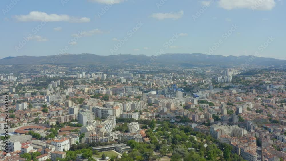Aerial shot of Marseille in the sun with its red-roofed buildings, in France Aerial shot of Marseille in the sun with its red-roofed buildings, in France