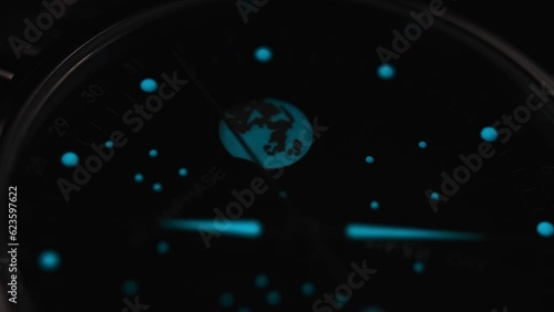 phosphor watch. back light luxury watch under water. lume shot of a watch. Glowing moon in the watch photo