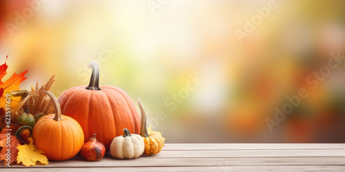 Festive autumn decor from pumpkins  corns and fall leaves. Concept of Thanksgiving day or Halloween  