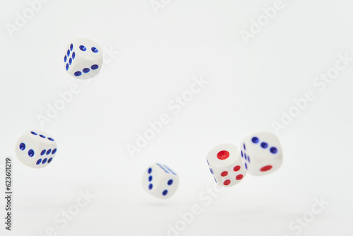 Playing dice for gambling and tabletop games  flying in air  poker isolated on white background  clipping path 