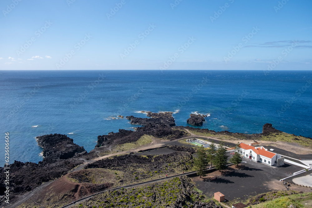 Aerial view of Ferraria with the Atlantic Ocean in Background. Thermal waters at Ponta da Ferraria, thermal waters in the sea and natural hot water pools. São Miguel island in Azores