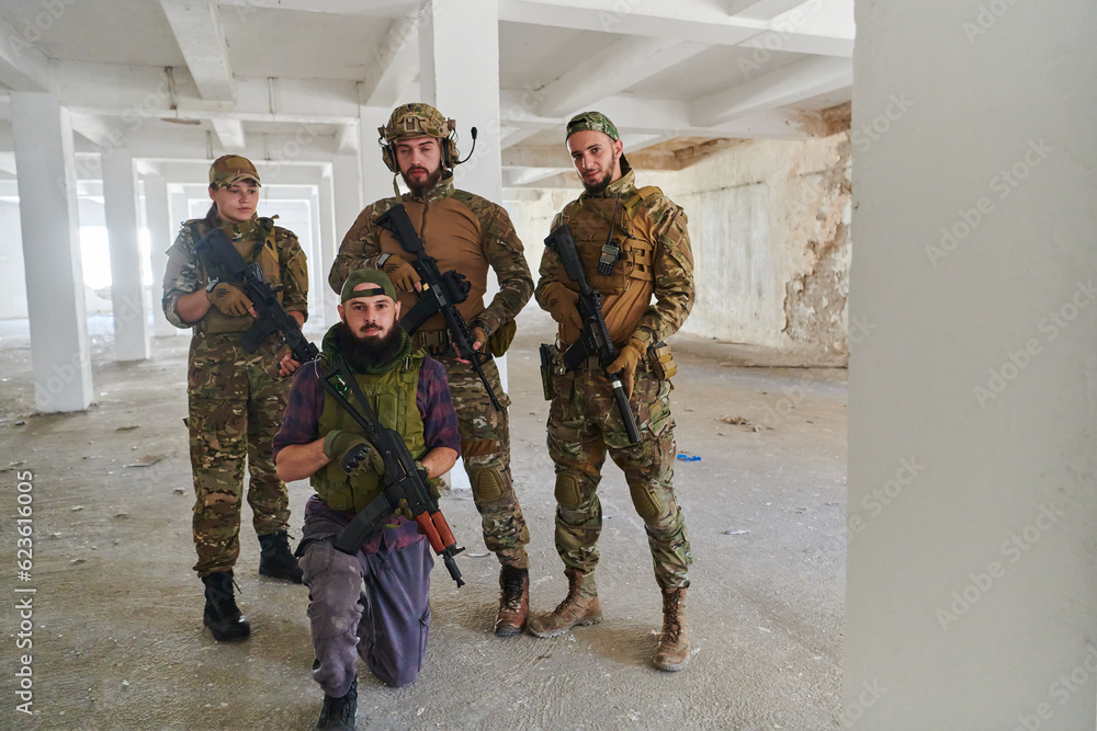 Fototapeta premium Soldier squad team portrait in urban environment