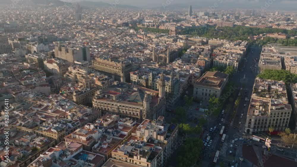 Aerial panoramic view of tourist landmark in historic part of metropolis at golden hour. Barcelona, Spain Aerial panoramic view of tourist landmark in historic part of metropolis at golden hour. Barcelona, Spain