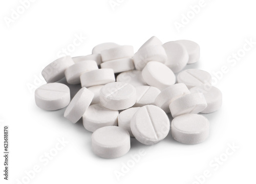 Pile of round pills on light grey background