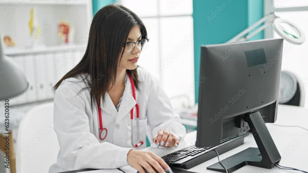Young caucasian woman doctor suffering for cervical pain working at clinic Young caucasian woman doctor suffering for cervical pain working at clinic