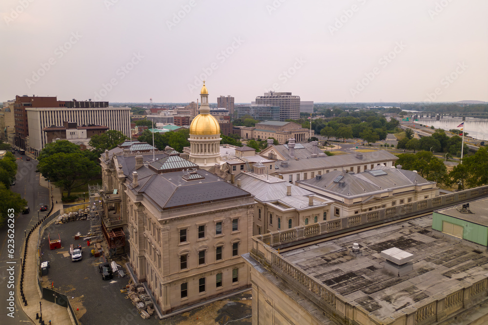 The dome of the capitol building is seen from the top of the building.