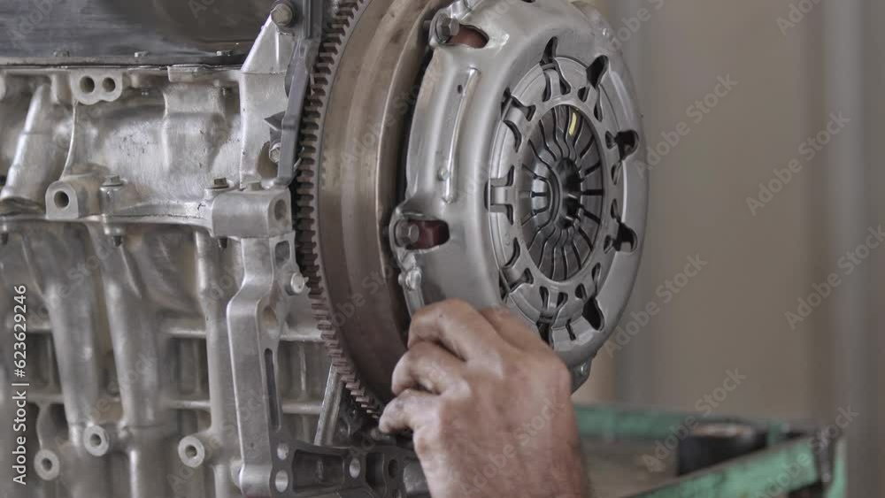 Car Engine Clutch Pad Replacement in the Repair Shop Footage. Car Engine Clutch Pad Replacement in the Repair Shop Footage.