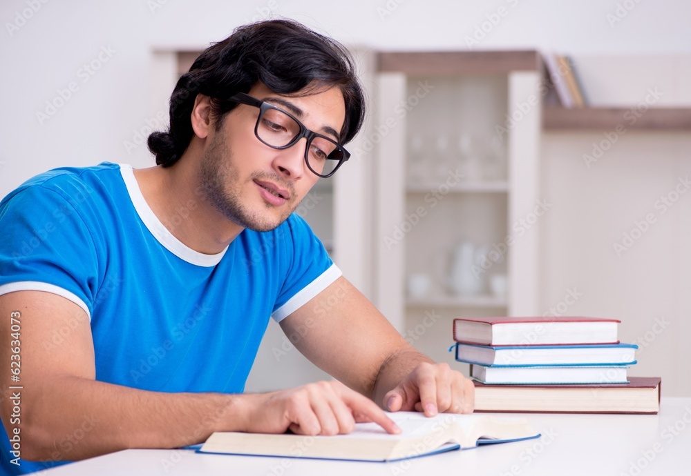 Young handsome student studying at home Young handsome student studying at home