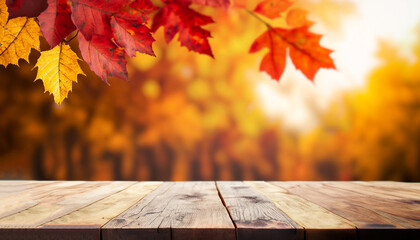 Wooden table and blurred Autumn background. Autumn concept with red-yellow leaves background.