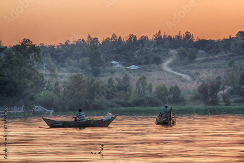 Sun rises on Lake Victoria near the village of Seme in western Kenya. 