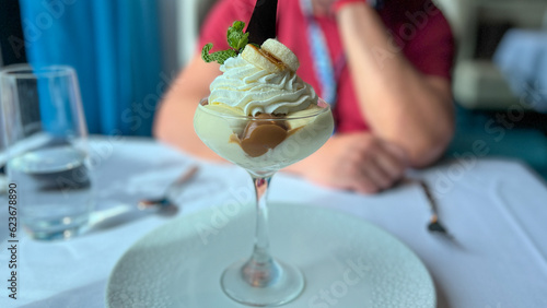 Banana Banoffe decadent dessert at a restaurant on a cruise ship. photo