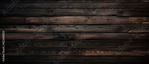 Thin wooden dark boards fence, textural banner background