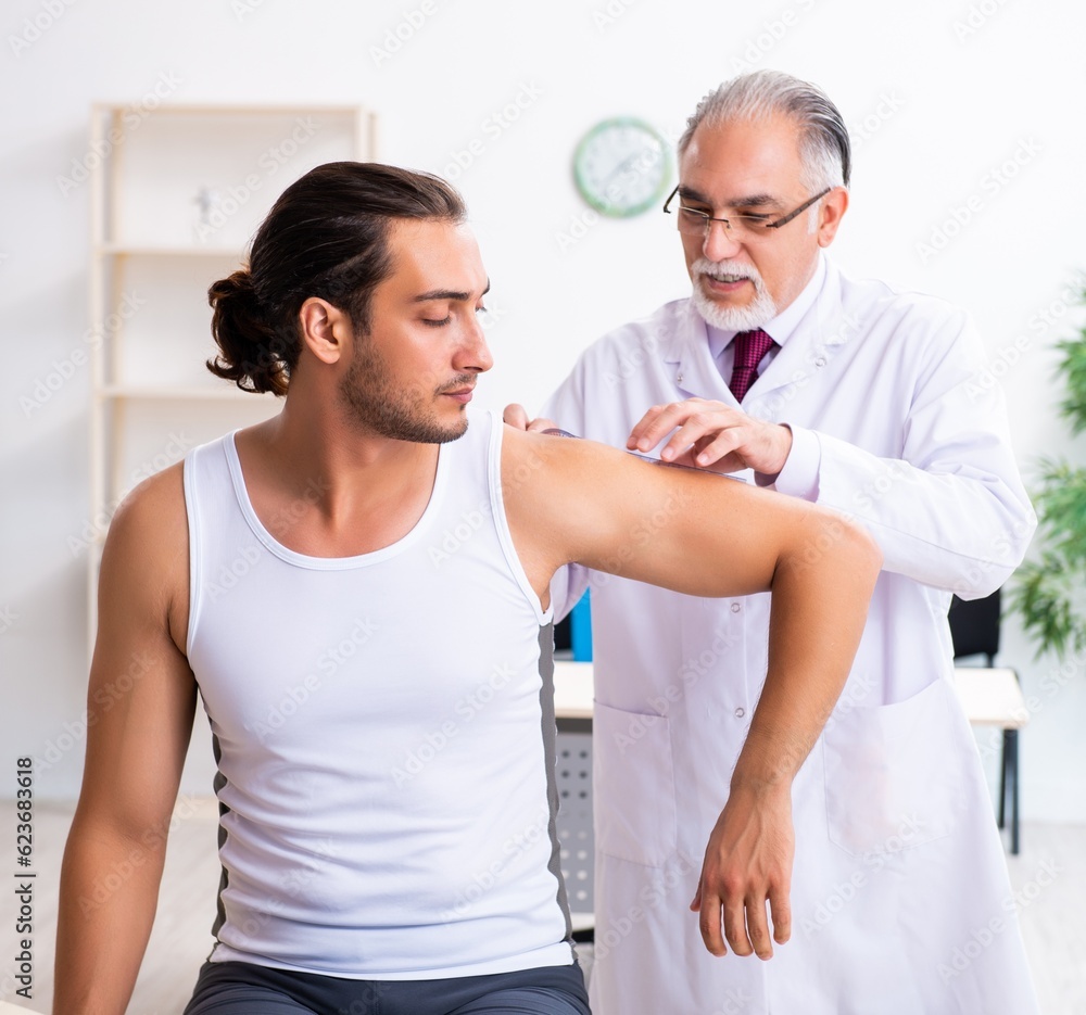 Young male patient visiting experienced doctor Young male patient visiting experienced doctor