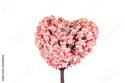 Small artificial tree on white background.