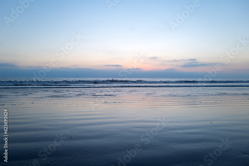 Sea water landscape with clouds on horizon. Calm sea ocean and sky background.