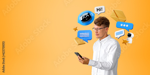 Businessman with smartphone, chat bot speech bubbles and online communication
