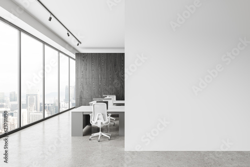 Coworking room interior with table and chairs, laptop and window. Mock up wall
