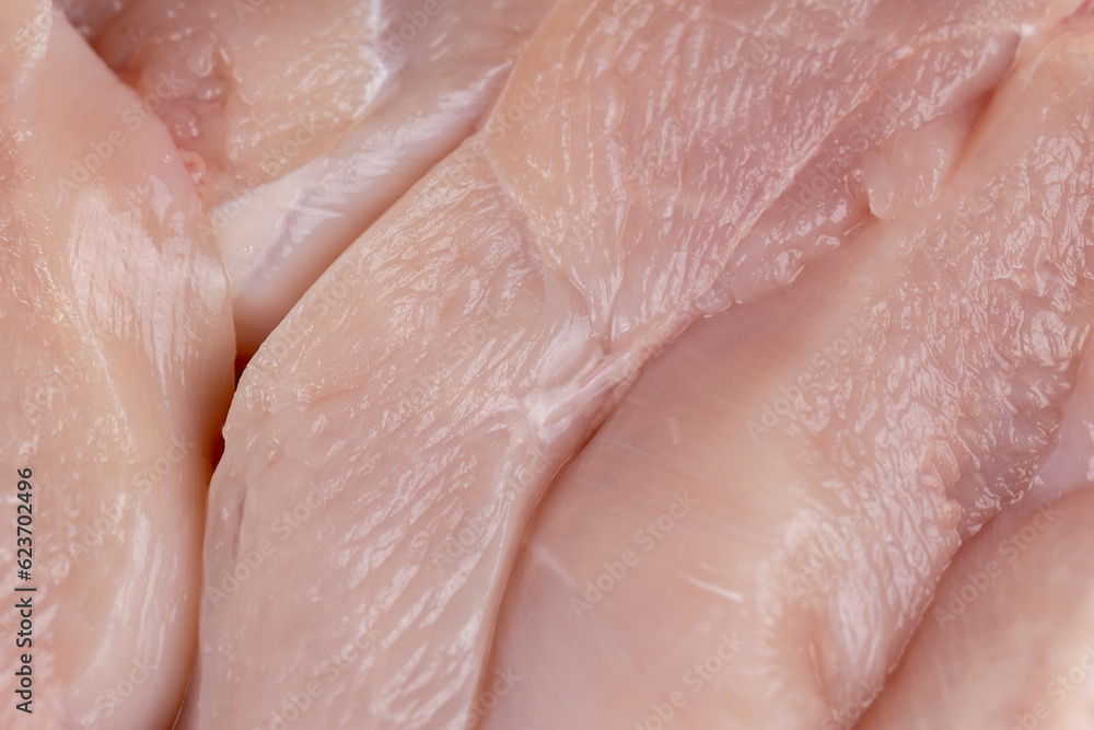 fresh and raw chicken meat during cooking fresh and raw chicken meat during cooking