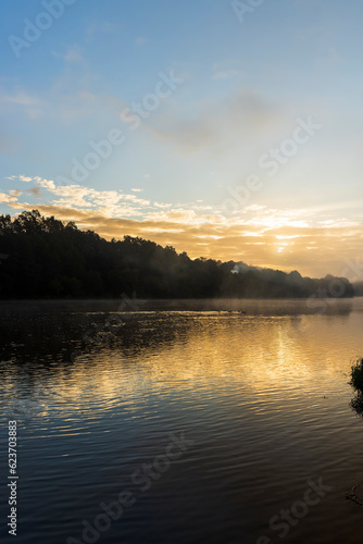 Fototapeta Naklejka Na Ścianę i Meble -  Small fog on the river in autumn