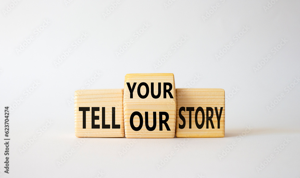 Tell Your or Our story symbol. Wooden cubes with words Tell Our story and Tell Your story. Beautiful white background. Business concept. Copy space Tell Your or Our story symbol. Wooden cubes with words Tell Our story and Tell Your story. Beautiful white background. Business concept. Copy space