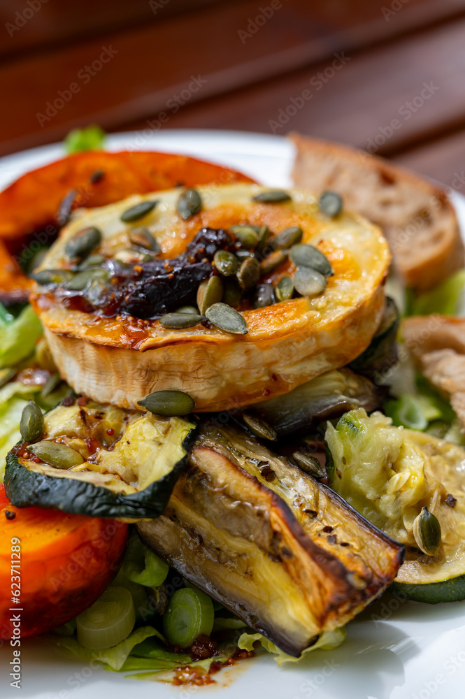 Healthy vegetarian food, Grilled vegetables with goat cheese salad Healthy vegetarian food, Grilled vegetables with goat cheese salad