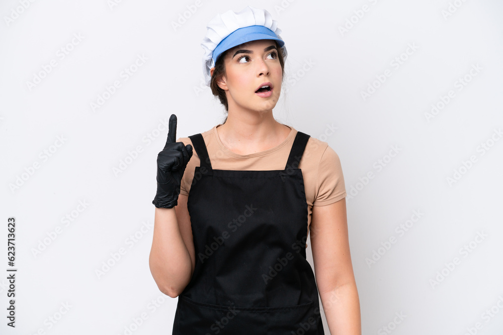 Fishmonger brazilian woman wearing an apron isolated on white background thinking an idea pointing the finger up Fishmonger brazilian woman wearing an apron isolated on white background thinking an idea pointing the finger up