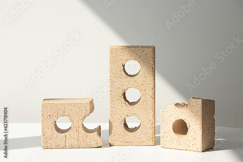 beige brick block with holes photo