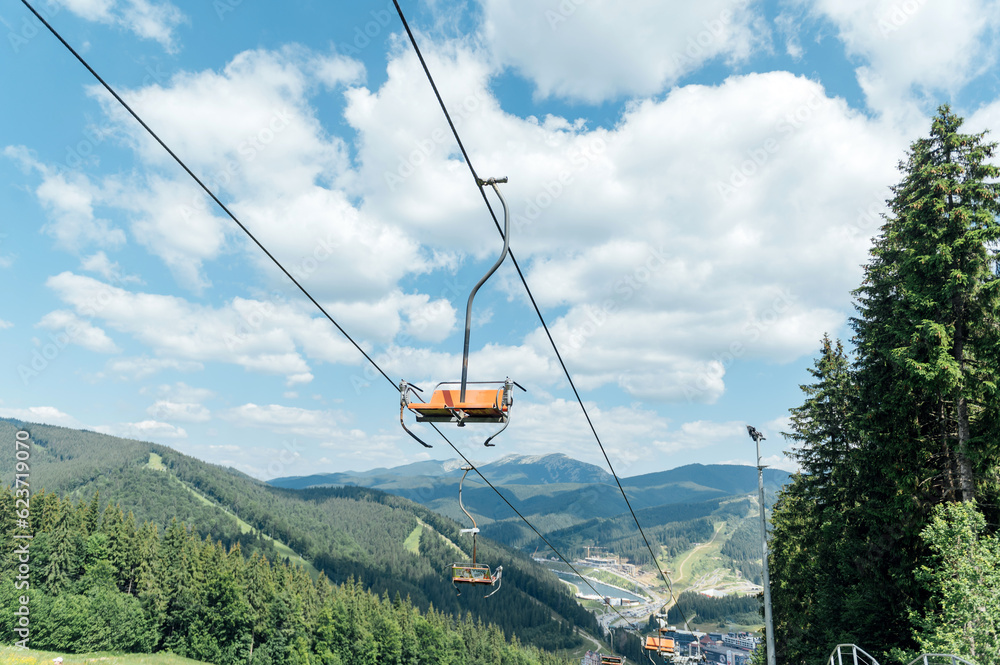 View from the lift to the Carpathian mountains. Tourists move looking at the landscapes