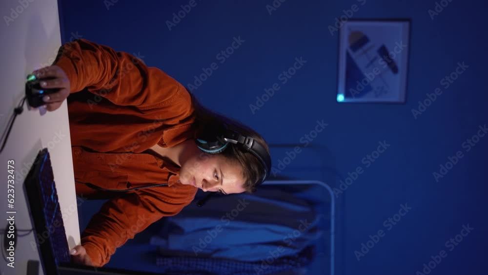 Delighted woman winning the computer game, cybersport young pro gamer happy with winning the game, show YES hand gesture and celebrating victory Delighted woman winning the computer game, cybersport young pro gamer happy with winning the game, show YES hand gesture and celebrating victory