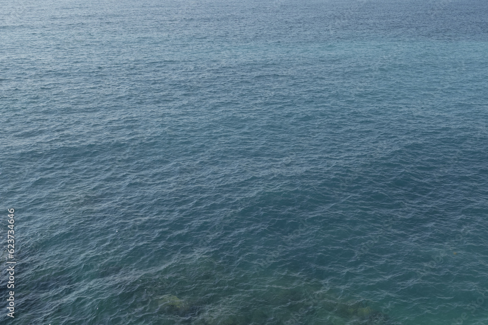 Calm turquoise Mediterranean sea background Calm turquoise Mediterranean sea background