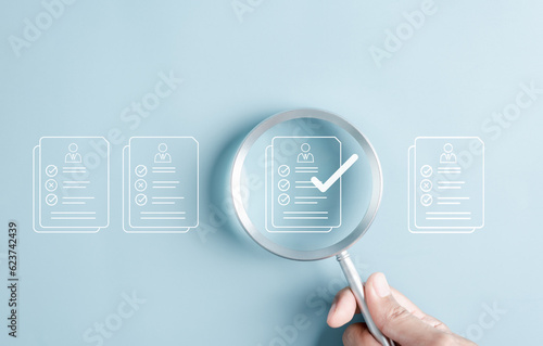 Document Management Checking System, online documentation database and process manage files, Magnifier check and focus to document folder, documentation. Corporate business technology concept.