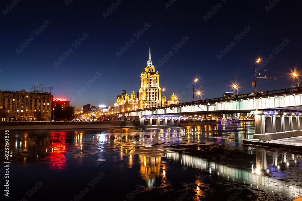 Night Moscow. View of the Moskva River, Novoarbatsky Bridge and the Ukraine Hotel at night. Moscow, Russia
