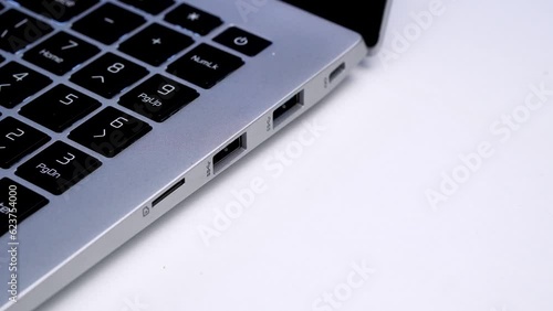 Wallpaper Mural Plug-in usb cable into laptop closeup 4K Torontodigital.ca