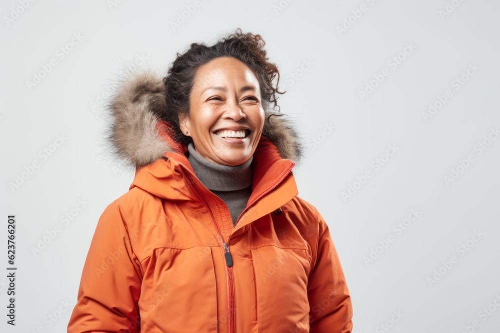 Smiling african american woman in winter jacket on white background Smiling african american woman in winter jacket on white background