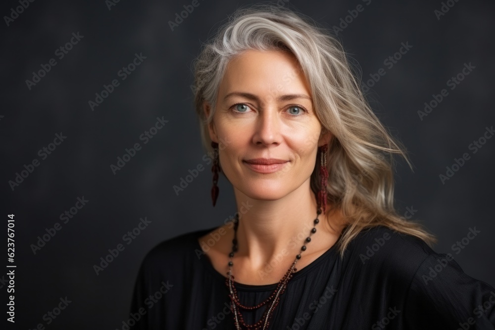 Portrait of a beautiful middle-aged woman with gray hair. Portrait of a beautiful middle-aged woman with gray hair.