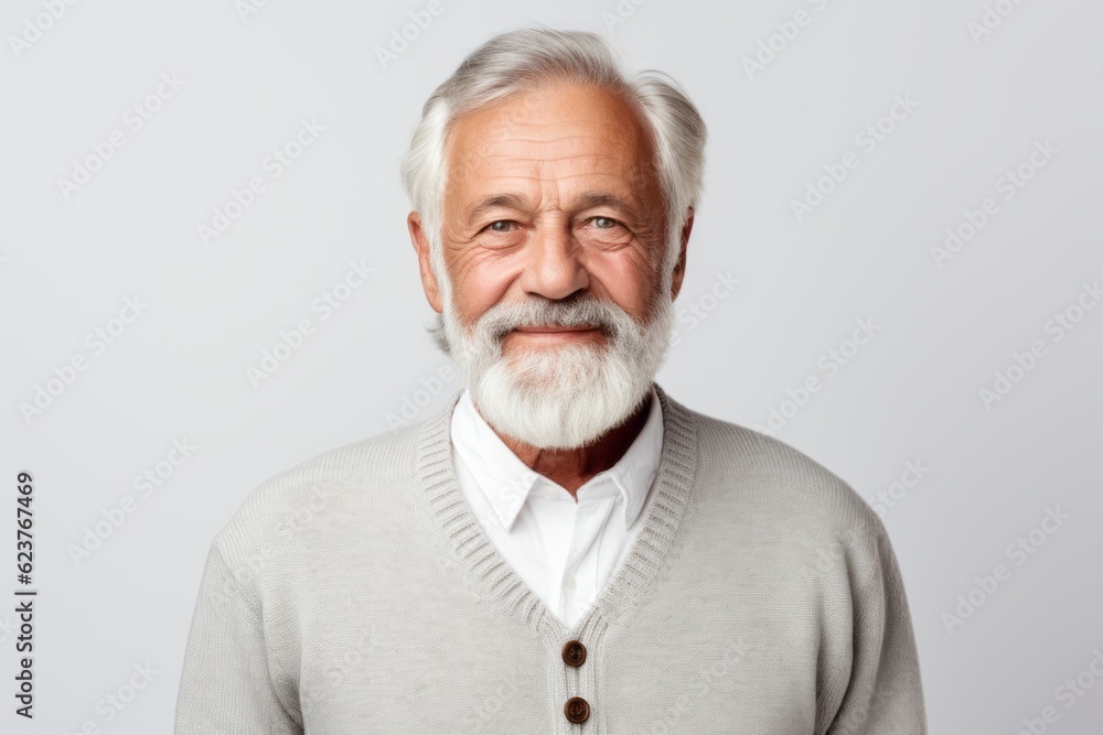 Portrait of senior man with grey hair and beard looking at camera Portrait of senior man with grey hair and beard looking at camera