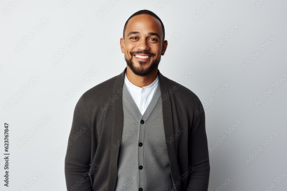 Handsome african american man smiling and looking at camera Handsome african american man smiling and looking at camera