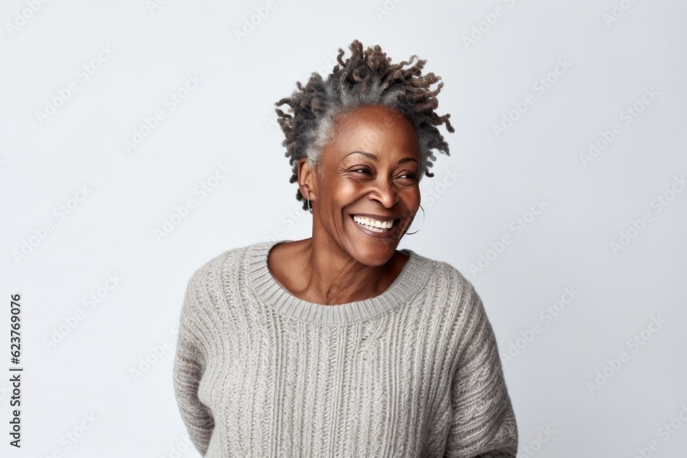 Fototapeta premium Portrait of a happy african american woman smiling at camera