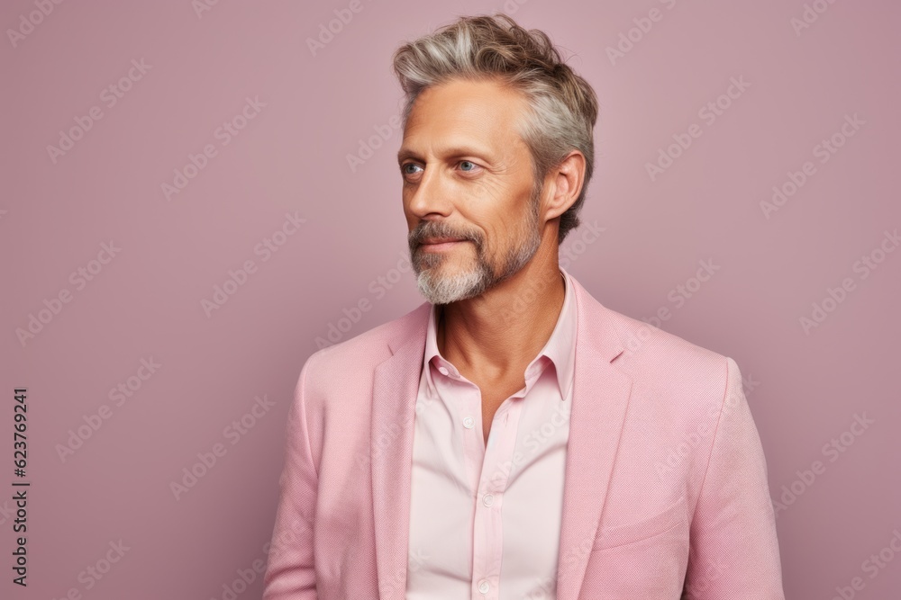 Portrait photography of a satisfied Russian man in his 40s wearing a chic cardigan against a pastel or soft colors background Portrait photography of a satisfied Russian man in his 40s wearing a chic cardigan against a pastel or soft colors background