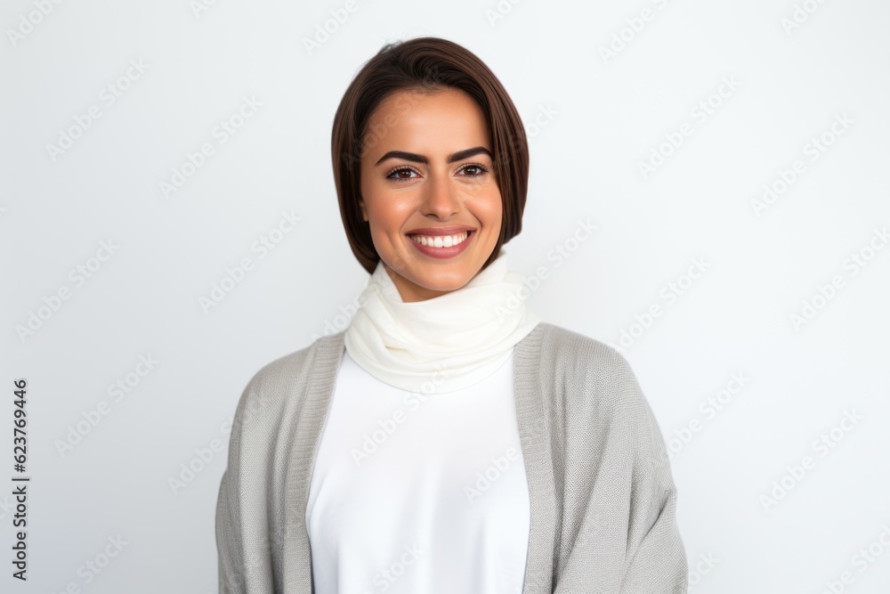 Portrait of a beautiful young woman with a scarf on her neck Portrait of a beautiful young woman with a scarf on her neck