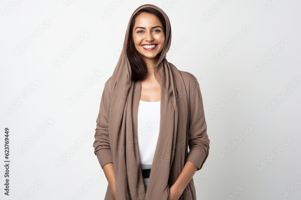 Portrait of a beautiful young woman smiling on a white background. Portrait of a beautiful young woman smiling on a white background.