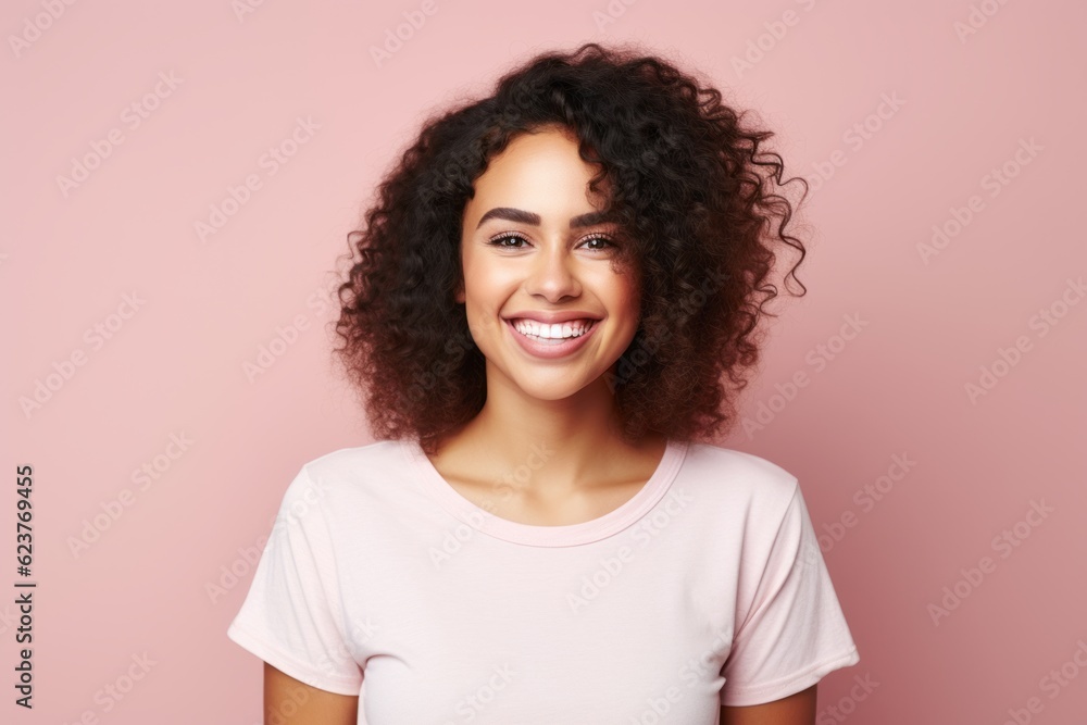 Portrait of beautiful young african american woman smiling at camera Portrait of beautiful young african american woman smiling at camera