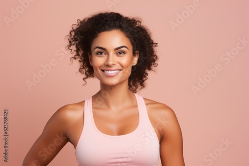 Portrait of smiling african american woman in sportswear