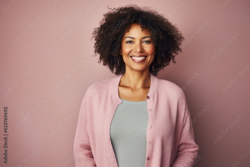 Portrait of a smiling african american woman with curly hair Portrait of a smiling african american woman with curly hair