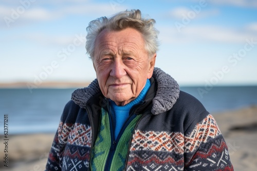 Senior man with grey hair on the beach of Baltic Sea in winter © Robert MEYNER