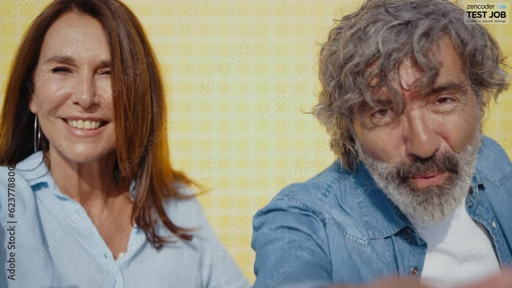Cinematic video of a senior couple spending time on the beach and making different activities near the ocean. Romantic concept about a man and a woman in love. Lifestyle in the seniority age Cinematic video of a senior couple spending time on the beach and making different activities near the ocean. Romantic concept about a man and a woman in love. Lifestyle in the seniority age