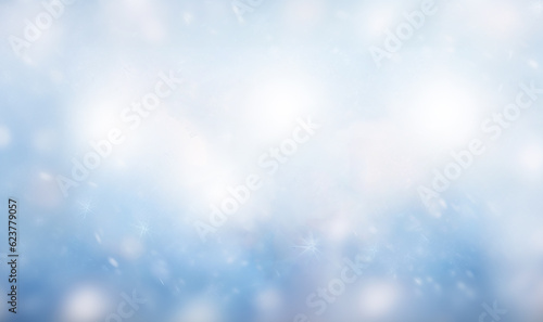 Magical winter background with snow,snowflakes and soft bokeh lights on blue sky,cold backdrop for Christmas. Snowy still life at frosty weather time blurred magical background © annebel146